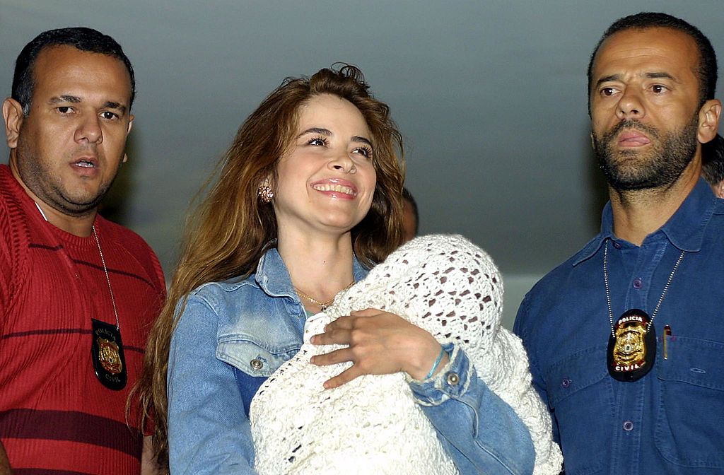Mexican Singer Gloria Trevi (C) And Her Son Angel